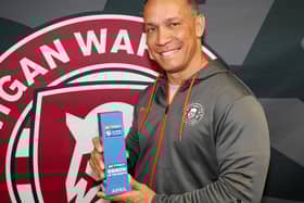 Adrian Lam with his Coach of the Month prize