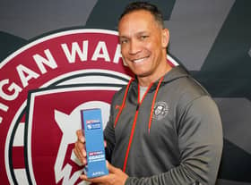 Adrian Lam with his Coach of the Month prize