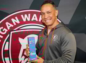 Adrian Lam with his Coach of the Month prize