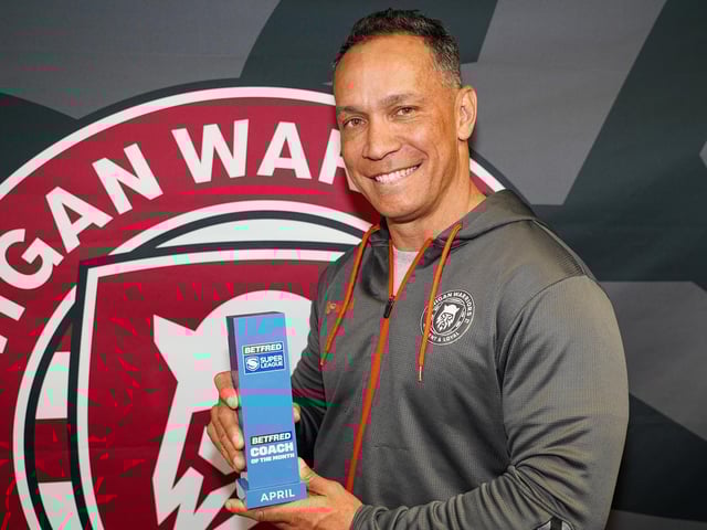 Adrian Lam with his Coach of the Month prize