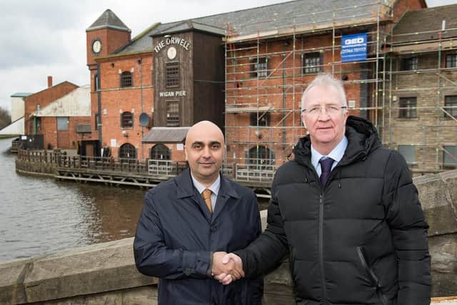 Harinder Dhaliwal, managing director of Step Places with Councillor David Molyneux, leader for Wigan Council