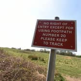 A sign for walkers on the land