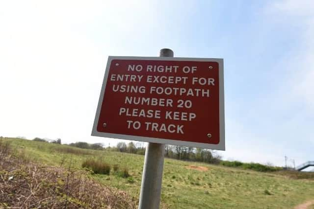 A sign for walkers on the land