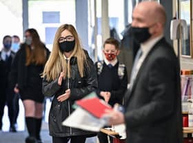 Secondary school pupils in England will no longer be required to wear face masks in class from next week