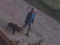Keith Grundy was seen on CCTV walking away with his dogs