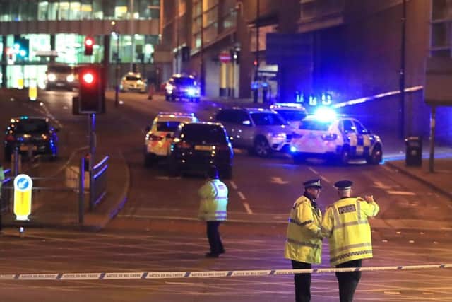Police officers at Manchester Arena on the night of the attack