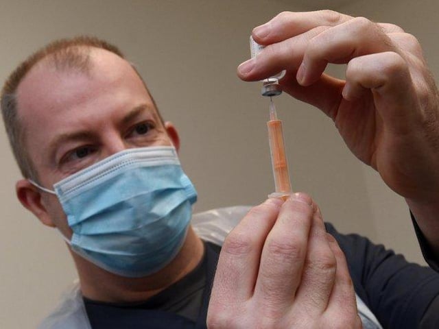 Pharmacist Justin Budworth at Hollowood Vaccination Centre, Mesnes Street, Wigan