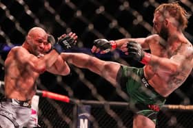 Mike Grundy (left) fighting