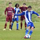 Harry McHugh converts the winning penalty against Ipswich