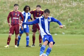 Harry McHugh converts the winning penalty against Ipswich