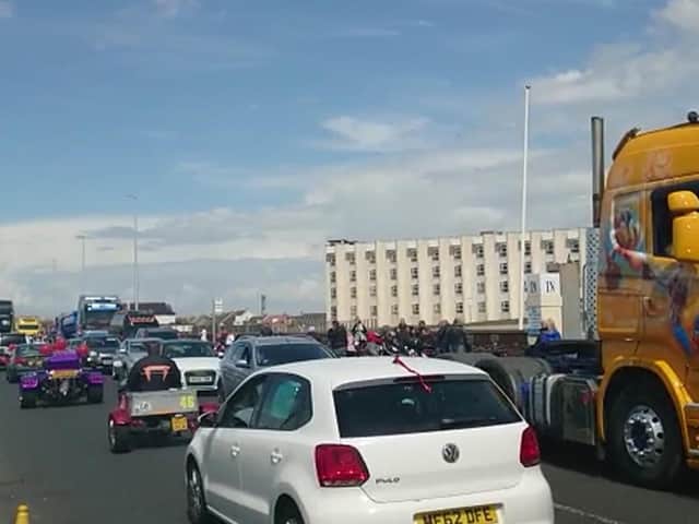 Hundreds gather in preparation for a convoy in memory of Jordan Banks
