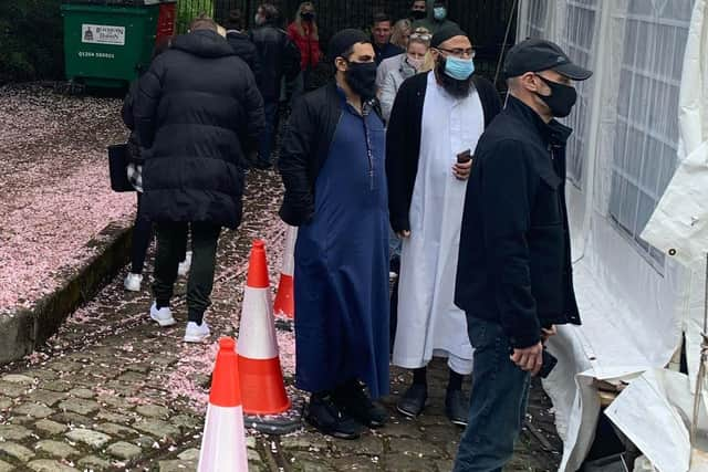 People at a covid vaccination centre in Blackburn