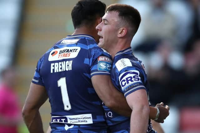 Bevan French and Harry Smith celebrate a try