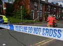 Fire and Police at the scene on Vine Street, Whelley.