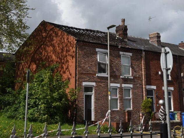 Damage to the roof following the house fire in Vine Street, Whelley