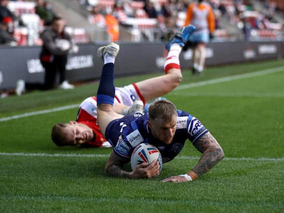 Dom Manfredi goes over for one of Wigan's six tries at Leigh