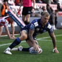 Wigan Warriors' Dominic Manfredi scores their second try of the match during the Betfred Super League match at Leigh Sports Village, Leigh.