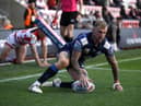 Wigan Warriors' Dominic Manfredi scores their second try of the match during the Betfred Super League match at Leigh Sports Village, Leigh.