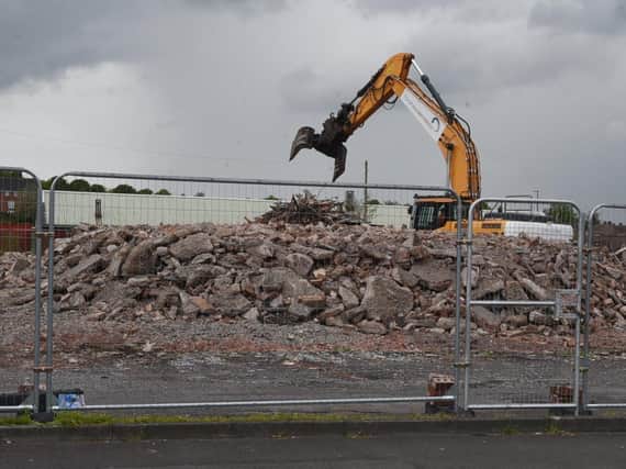 Bulldozers at work on the Labour club site in Scot Lane