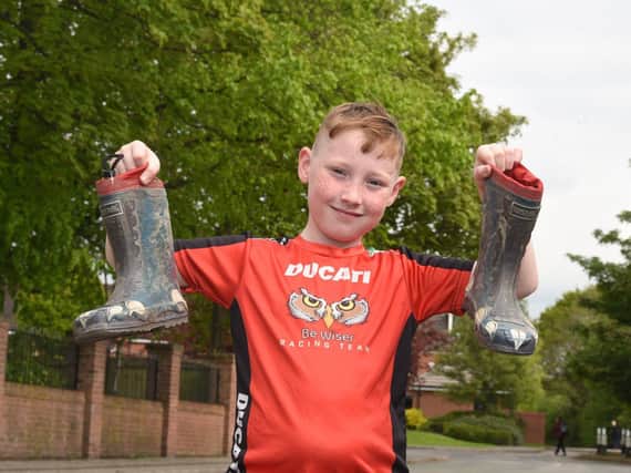 John-Joe Redford, nine, is taking on a 200km walking challenge over the month to raise funds for the neo-natal unit at Wigan Infirmary