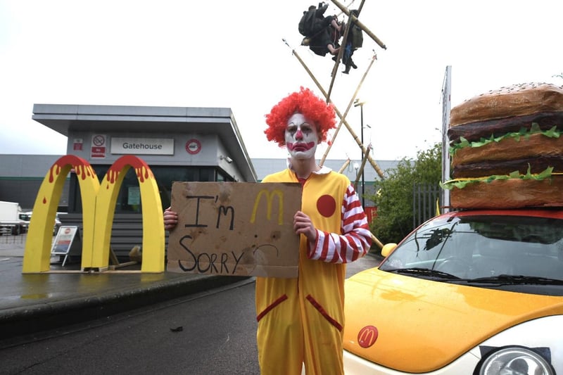 Animal Rebellion protester dressed as a clown