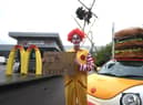 Animal Rebellion protester dressed as a clown