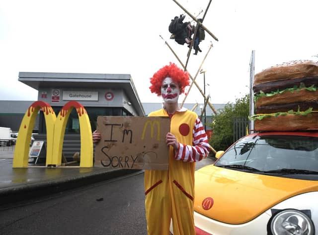 Animal Rebellion protester dressed as a clown