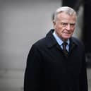 Max Mosley arrives to give evidence at The Leveson Inquiry at The Royal Courts of Justice on November 21, 2011 in London