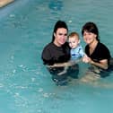 Kirsty and Preston Jolley in the pool with Emma Aspinall