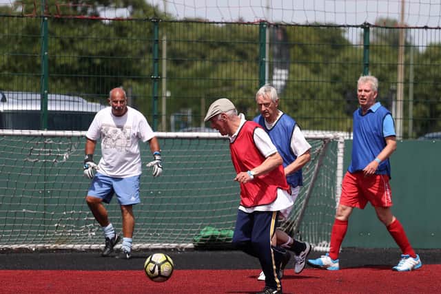 The Age UK Wigan Borough branch has launched a new walking football programme for older people (Credit: FA)