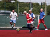 The Age UK Wigan Borough branch has launched a new walking football programme for older people (Credit: FA)