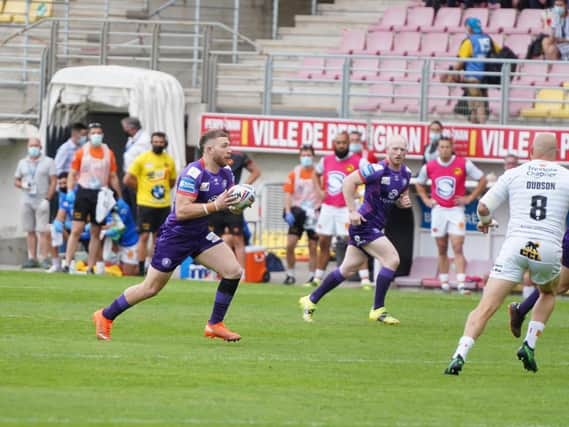 Jackson Hastings takes on the Catalans line on a rare Wigan sortie in Perpignan