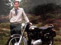 Michael with his Royal Enfield Bullet at the end of his 4,000-mile bike ride from India to the UK in 1980.