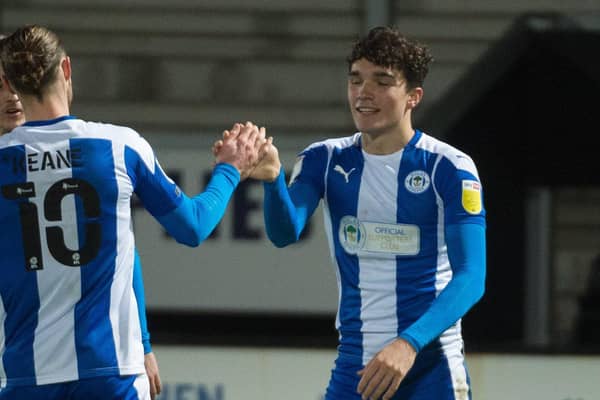 Kyle Joseph celebrates with Will Keane