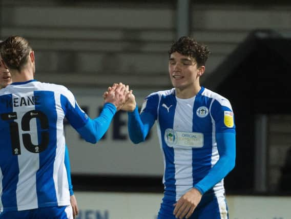 Kyle Joseph celebrates with Will Keane