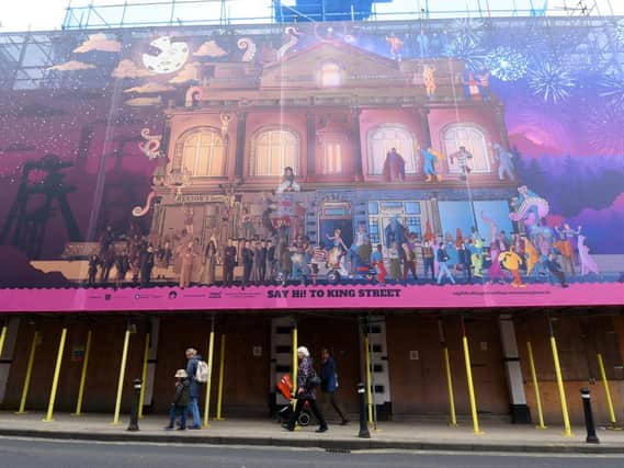 Dom Foster's mural on the scaffolding of the Royal Court Theatre on King Street