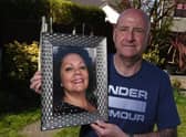 Ian Barlow, from Orrell, with a picture of his late wife Michelle
