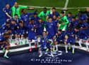 Cesar Azpilicueta the captain of Chelsea lifts the Champions League Trophy following their team's victory during the UEFA Champions League Final between Manchester City and Chelsea FC at Estadio do Dragao on May 29, 2021 in Porto, Portugal.
