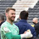 Jamie Jones celebrates after helping Latics avoid the drop
