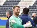Jamie Jones celebrates after helping Latics avoid the drop