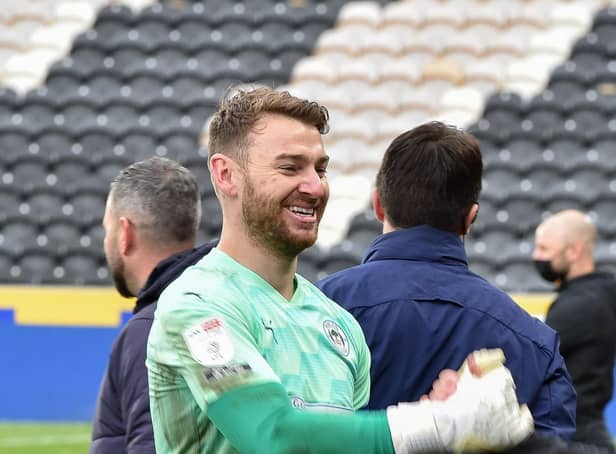 Jamie Jones celebrates after helping Latics avoid the drop