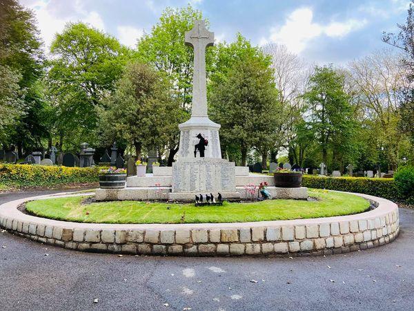 The cleaned-up war memorial at Tyldesley Cemetery