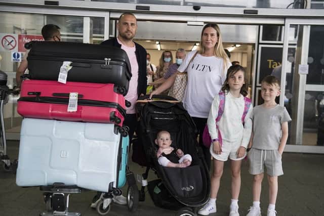 Paul and Jemma Nevard, and their three children (names not given) who live in Bromley, arrive at Gatwick Airport in West Sussex after returning on a flight from Porto Santo in Madeira, Portugal, before Tuesday's 4am requirement for travellers arriving from Portugal to quarantine for 10 days comes into force