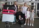 Paul and Jemma Nevard, and their three children (names not given) who live in Bromley, arrive at Gatwick Airport in West Sussex after returning on a flight from Porto Santo in Madeira, Portugal, before Tuesday's 4am requirement for travellers arriving from Portugal to quarantine for 10 days comes into force