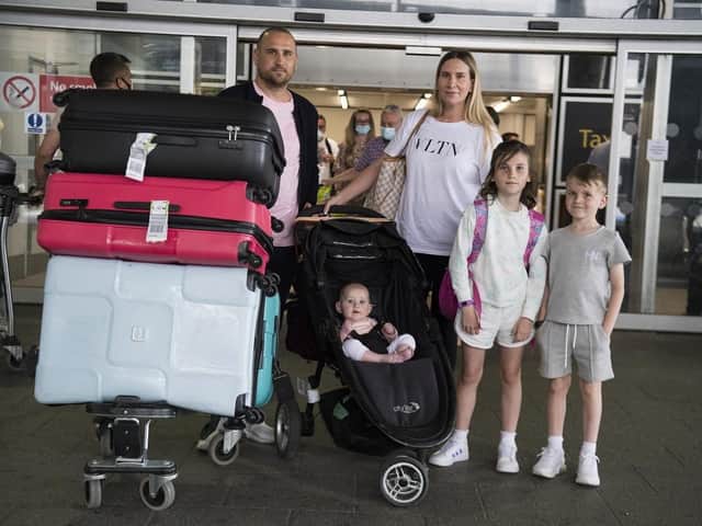 Paul and Jemma Nevard, and their three children (names not given) who live in Bromley, arrive at Gatwick Airport in West Sussex after returning on a flight from Porto Santo in Madeira, Portugal, before Tuesday's 4am requirement for travellers arriving from Portugal to quarantine for 10 days comes into force