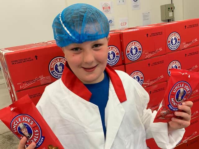 Ethan Rowbotham, 10, at the Toffee Works where Uncle Joe’s Mint Balls are made