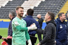 Jamie Jones and Leam Richardson celebrate survival at Hull last month