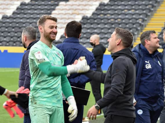 Jamie Jones and Leam Richardson celebrate survival at Hull last month