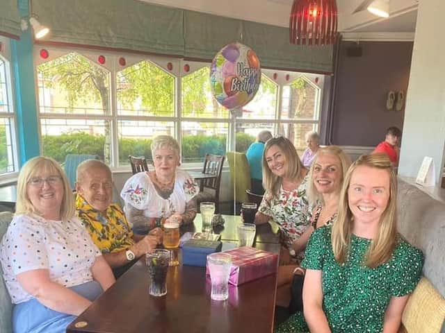 Eric Whitter celebrating his 77th birthday with friends