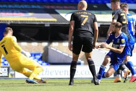 Gwion Edwards scores against Latics for Ipswich on the opening day of last season